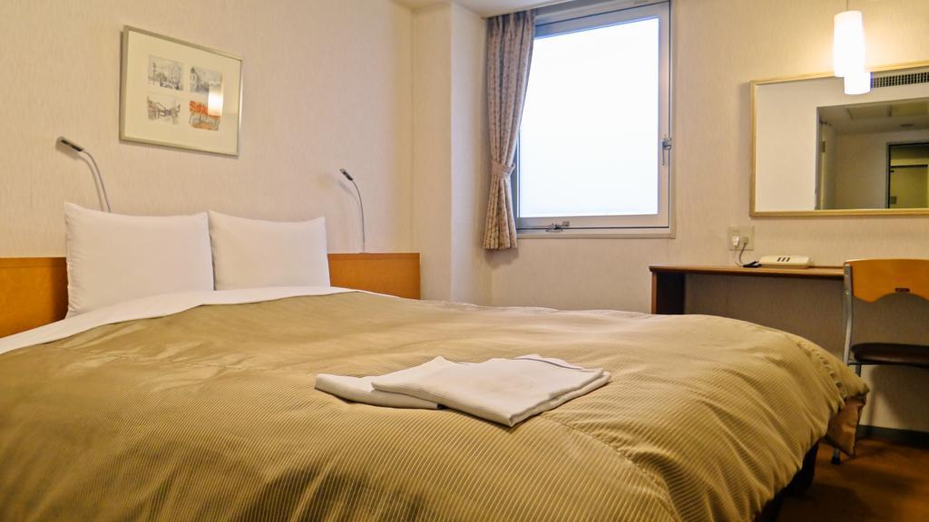 Morioka City Hotel Quarto foto